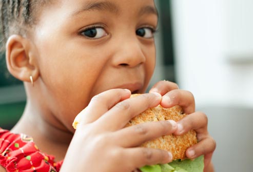 getty_rf_photo_of_child_eating_sandwich